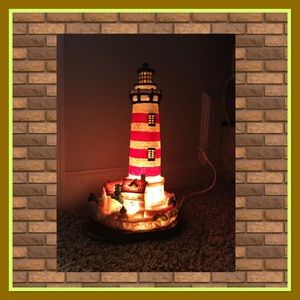 Lighthouse accent light, great decor lit or unlit.